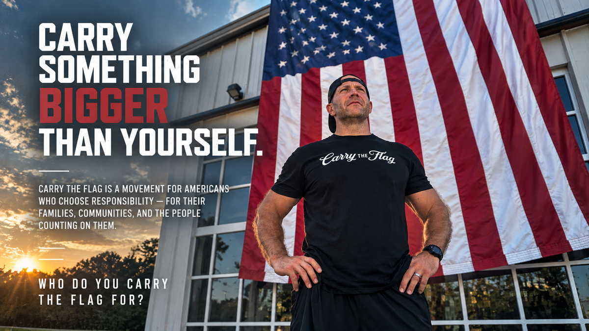 Man wearing a Carry The Flag shirt in front of an American flag